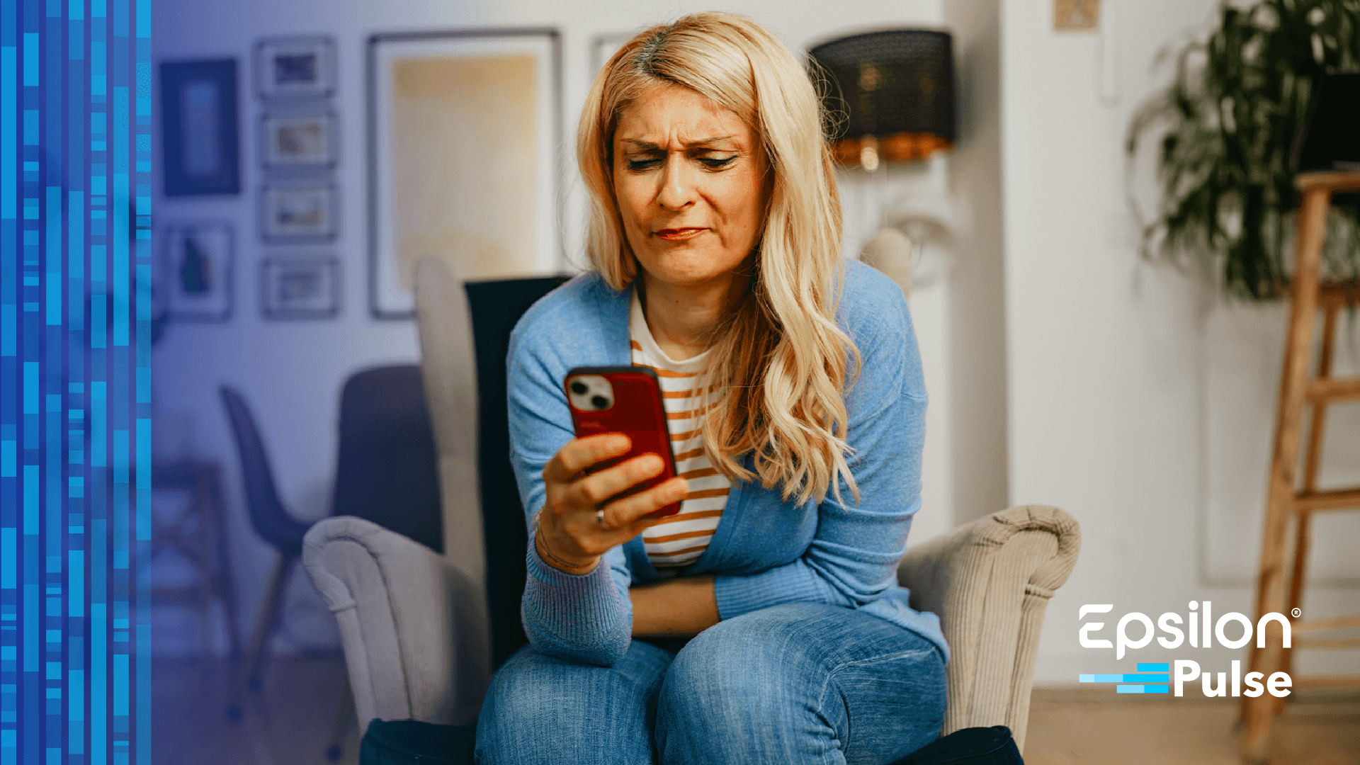Woman looking at her phone looking frustrated
